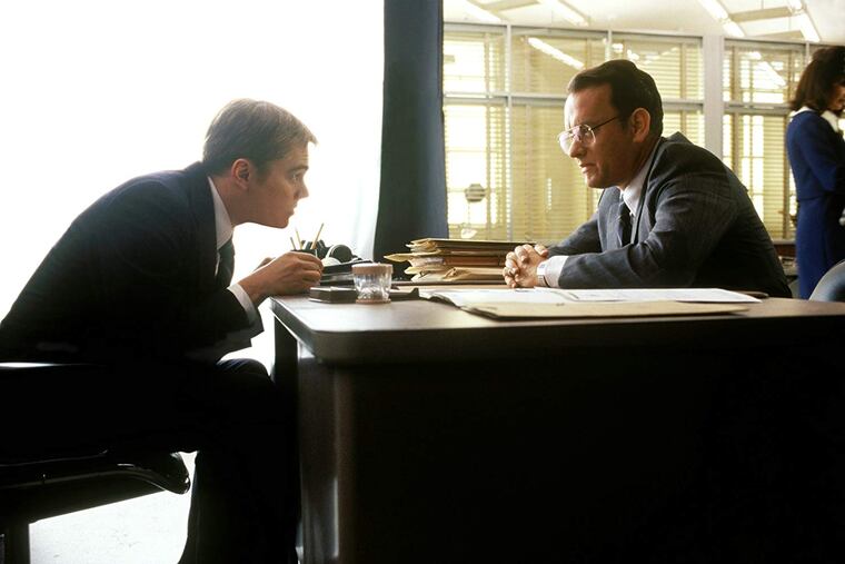 Leo DiCaprio as Frank Abagnale and Tom Hanks as an FBI agent in the 2002 movie "Catch Me If You Can".