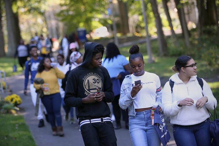 Students on the campus of Strawberry Mansion High School.
