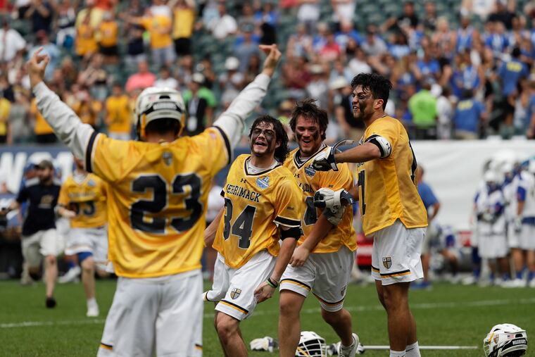 Merrimack players celebrate their NCAA men's lacrosse Division II championship at Lincoln Financial Field.