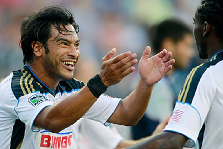 Forward Carlos Ruiz will no longer play with the Philadelphia Union. (Michael Dwyer/AP)