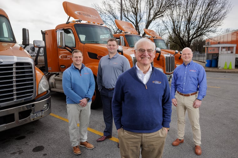 Peter A. Latta (front), grandson of the founder of A. Duie Pyle, with the next generation of A. Duie Pyle owners (from left) son Billy Latta, nephew Jack Latta, and Peter Latta's son-in-law Frank Granieri.