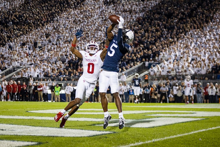 Penn State wide receiver Jahan Dotson catches an 8-yard touchdown pass in front of Indiana defensive back Raheem Layne II during the second quarter at Beaver Stadium.