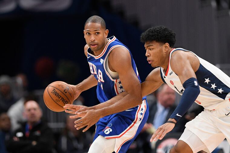 Al Horford, left, and his Sixers teammates are 5-7 on the road this season.
