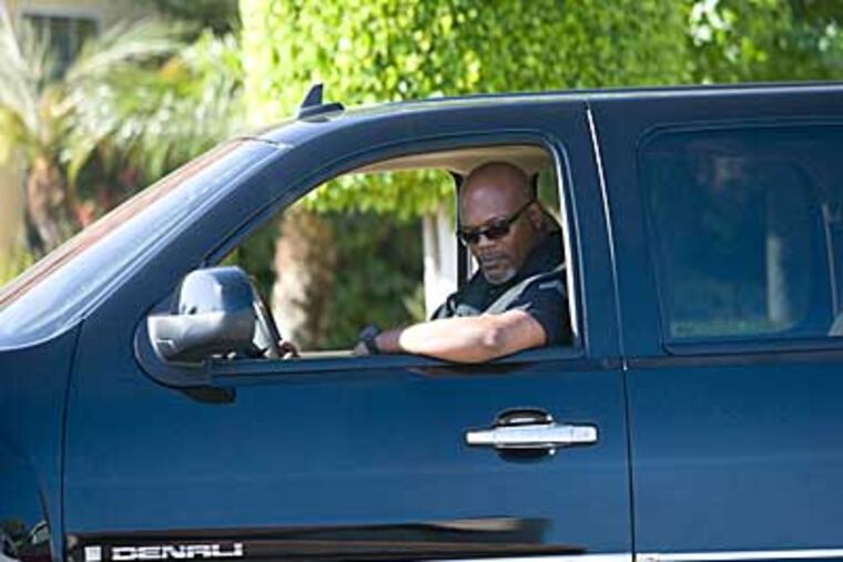 Samuel L. Jackson is a bigoted L.A. cop instilling fear into his new next-door neighbors, an interracial couple, in "Lakeview Terrace."