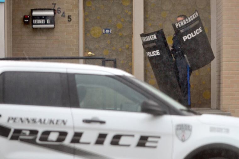 Police activity at the scene of a shooting on Maple Avenue in Pennsauken June 18, 2013. ( TOM GRALISH / Staff Photographer )