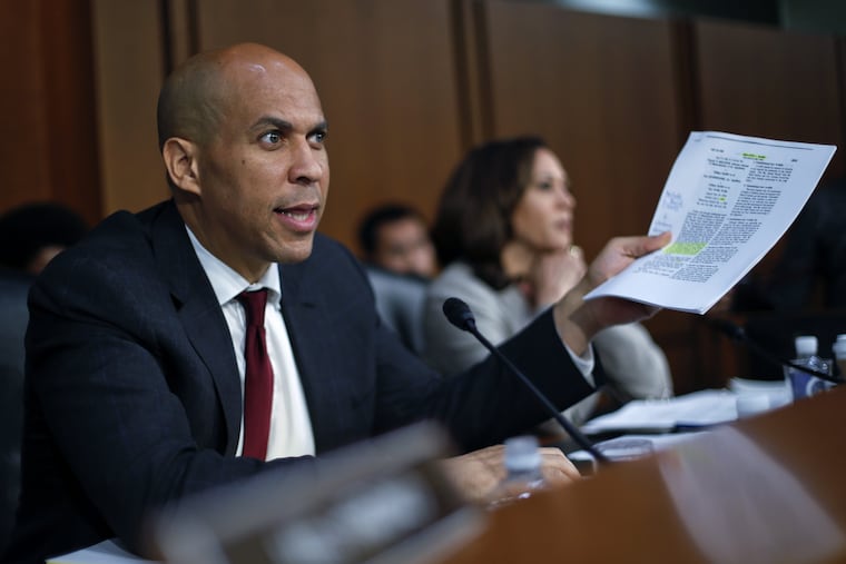 Sen. Cory Booker, D-N.J., questions witnesses before the Senate Judiciary Committee during the final stage of the confirmation hearing for President Donald Trump's Supreme Court nominee, Brett Kavanaugh, on Capitol Hill in Washington, Friday, Sept. 7, 2018.