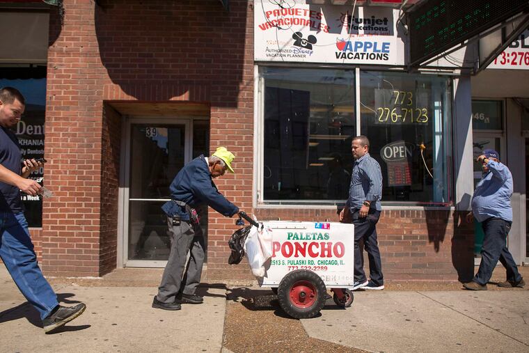 Fidencio Sanchez pushes his cart. Two strangers were moved by his story to get the online retirement fund rolling.