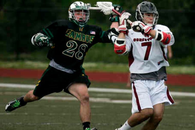 Conestoga's Ryan Buttenbaum gets off a shot despite the efforts of Emmaus' Tate Klidonas in the fourth quarter.After yesterday's PIAA quarterfinal win, Conestoga will play Springfield (Delco) in the semifinals Tuesday.