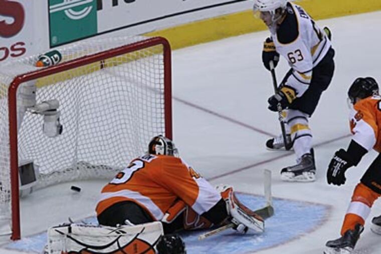 Tyler Ennis scored the game-winning goal in overtime past Flyers goalie Michael Leighton. (Michael Bryant/Staff Photographer)
