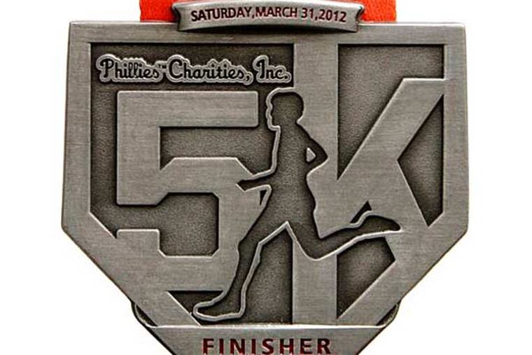 This Phillies 5K race medal was photographed on January 5, 2013. (Elizabeth Robertson/Staff Photographer)