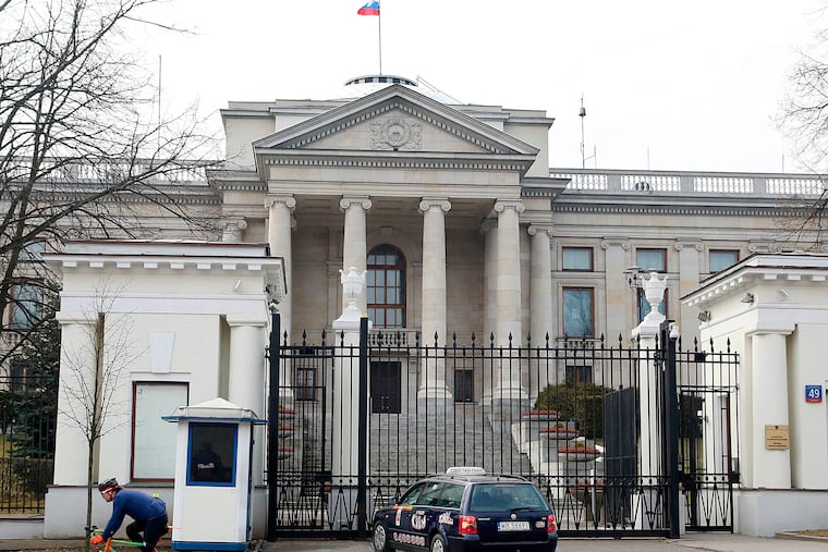 FILE - A taxi in front of the Russian Embassy in Warsaw, Poland, Monday, March 26, 2018.