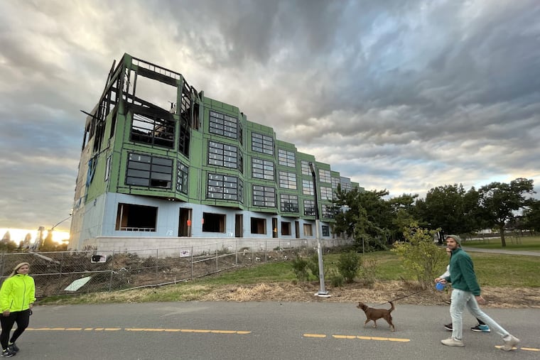 An Oct. 8 fire badly damaged the two end houses at The Views at Penn Treaty, which sits next to the Delaware River recreation trail. Work stopped on the project in early 2020.