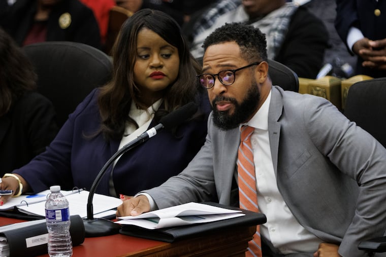 Jessie Lawrence, Mayor Cherelle Parker's director of planning and development, speaks in a City Council hearing as Tiffany W. Thurman, the mayor's chief of staff, looks on.