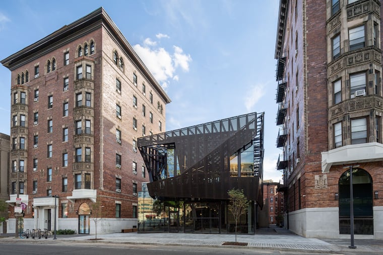 This freestanding structure was inserted into the courtyard of Hamilton Court, an apartment building at 39th and Chestnut, by Coscia Moos Architecture. It houses a gym and amenity space, as well as space for a restaurant and shop.