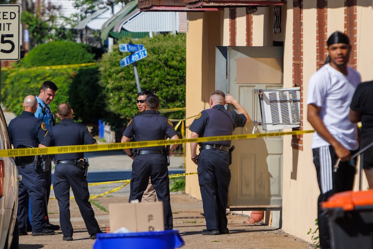 Chester Police officers investigate a shooting that took place at Delaware County Linen in May 2024. The suspect in that shooting, Wilbert Rosado-Ruiz, is awaiting a judge's ruling in his trial on murder and related crimes.