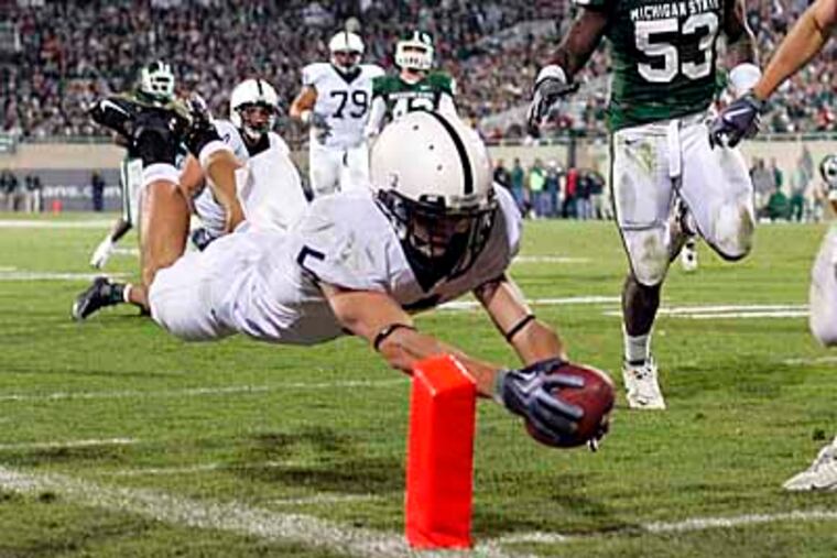 Penn State's Graham Zug dives into the end zone for a touchdown on a 27-yard pass reception. Penn State won 42-14. (AP Photo/Al Goldis)