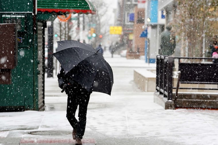 Snow Falls at the corner of Broad and Morris Streets, in South Philadelphia, Tuesday March 20th, 2018.