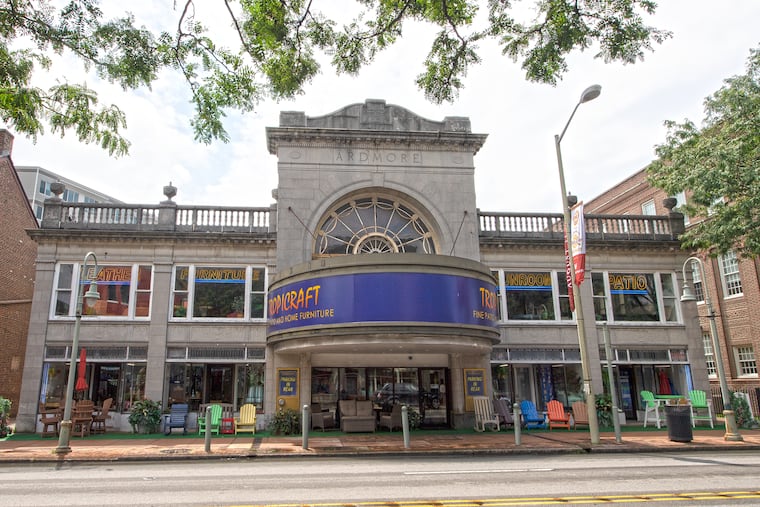 A developer is planning an 18-unit building on the site of the old Ardmore Theater, now a furniture store that still uses the old marquee and original building.