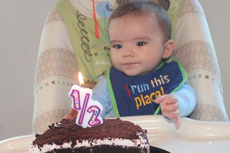 Melissa Storch's party in May for son Jeffrey's half birthday, with half a cake.