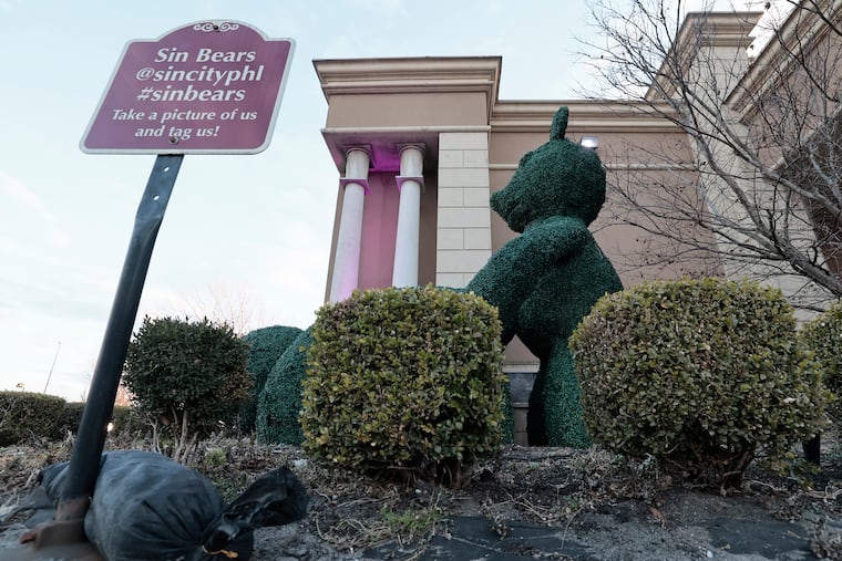 The "Sin City Bears," a pair of topiaries designed by Joe Kyte, in front of Sin City Cabaret Nightclub on Passyunk Ave. in Southwest Philadelphia.