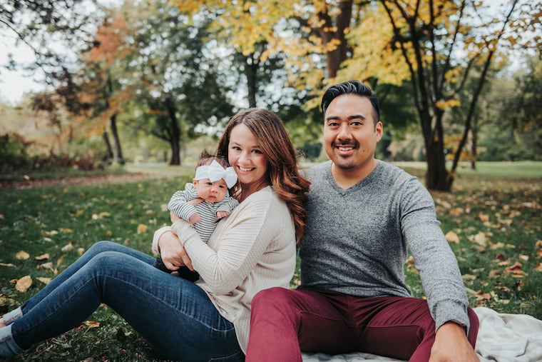Sarah and Kris Medina with Ruby Grace.