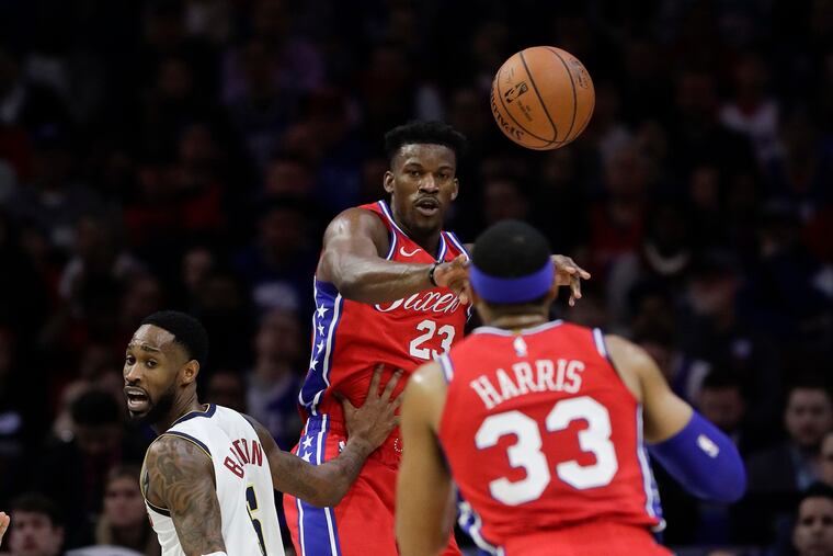 Jimmy Butler passes to Tobias Harris during last season.