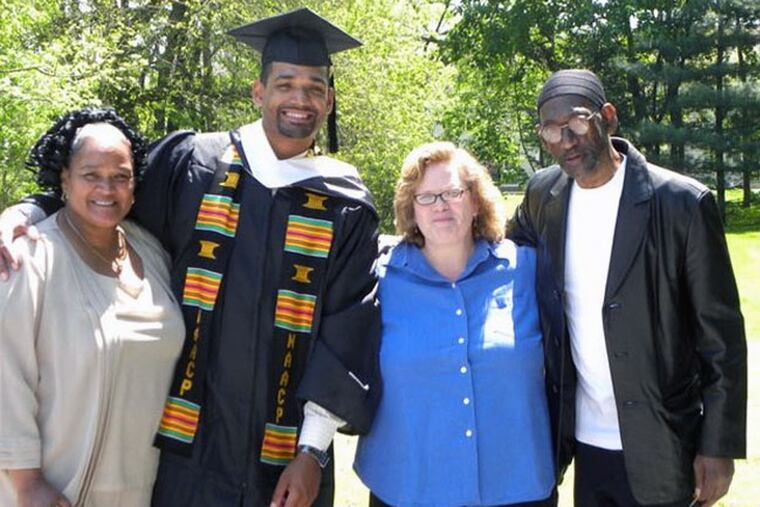 Thaddeus Desmond on his graduation day with birth mother Marsha Jamison, adoptive mother Kathy Desmond, and birth father Thaddeus Jamison Sr. Desmond will speak at the Democratic National Convention.