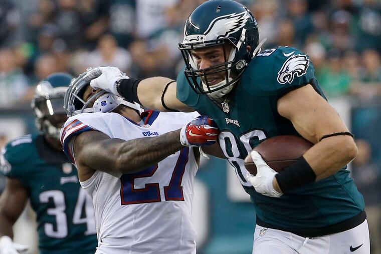 Zach Ertz delivers a stiff-arm to the Bills' Duke Williams last month. "This commitment that the Eagles have placed in me is something that I take a lot of pride in," Ertz said.