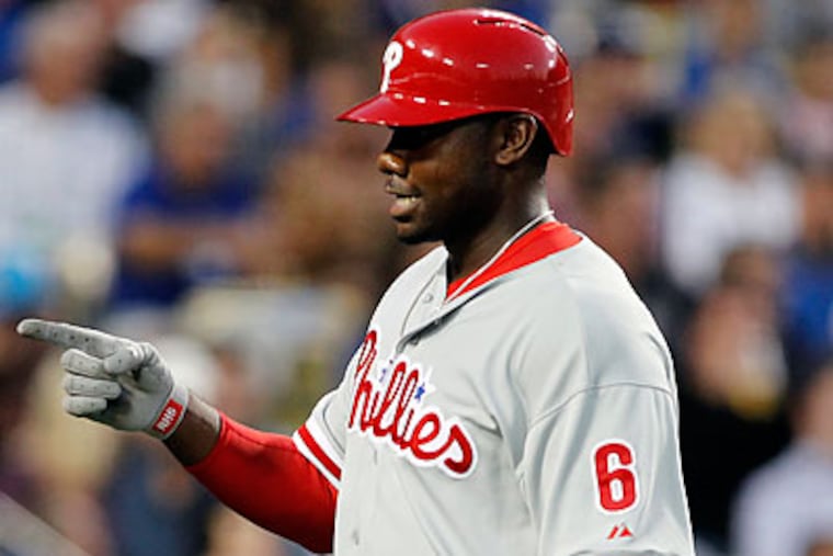 Ryan Howard hit his first home run of the season to help lift the Phillies' offense. (Danny Moloshok/AP)