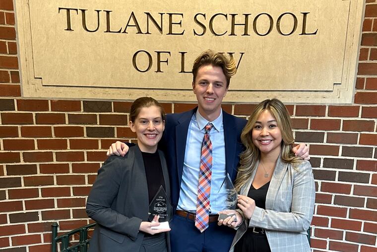 From left, Alex Shaff, David Brake, and Alyssa Rodarte, members of Villanova’s sports law negotiation team that won an international baseball arbitration competition.