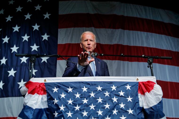 In this Aug. 9, 2019 photo, former Vice President and Democratic presidential candidate Joe Biden speaks at the Iowa Democratic Wing Ding at the Surf Ballroom, in Clear Lake, Iowa. As the U.S. economy flashes recession warning signs, Democratic presidential candidates are leveling pre-emptive blame on President Donald Trump. They argue that his aggressive and unpredictable tariff policies are to blame for gloomy economic forecasts. (AP Photo/John Locher)