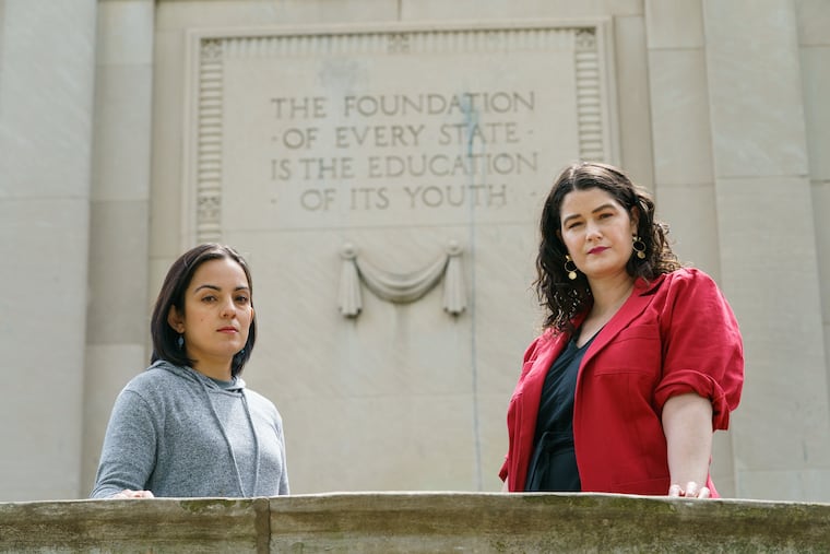 Parents Carla Lewandowski (left) and Mary Alice Duff are worried that a charter school trying to move into East Falls could drain students from their school, Mifflin Elementary.