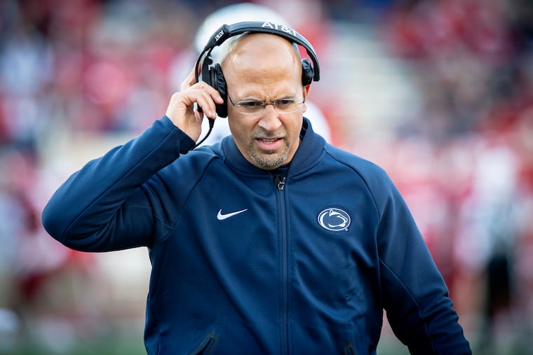 Penn State head coach James Franklin listens to his headphone during the second half of an NCAA college football game Saturday, Oct. 20, 2018, in Bloomington, Ind. Penn State won 33-28.
