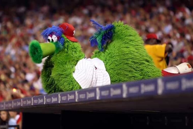 The Phanatic watches his team beat the Rockies.