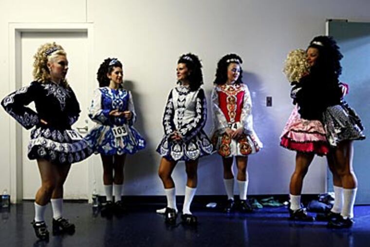 Dancers backstage at the "39th World Irish Dancing Championships" in Philadelphia yesterday. It's the first time the competition has been held outside the U.K. expects 6,000 competitors. (AP Photo/Matt Rourke)