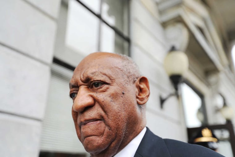 Bill Cosby leaves Montgomery County Courthouse with his spokesman Andrew Wyatt for the sixth day of deliberation after a mistrial was declared Saturday June 17th, 2017.