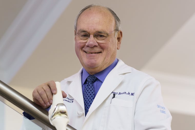 Dr. Booth did five knee replacements last March 26 on his 80th birthday.