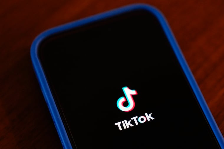 The TikTok app logo on an iPhone.