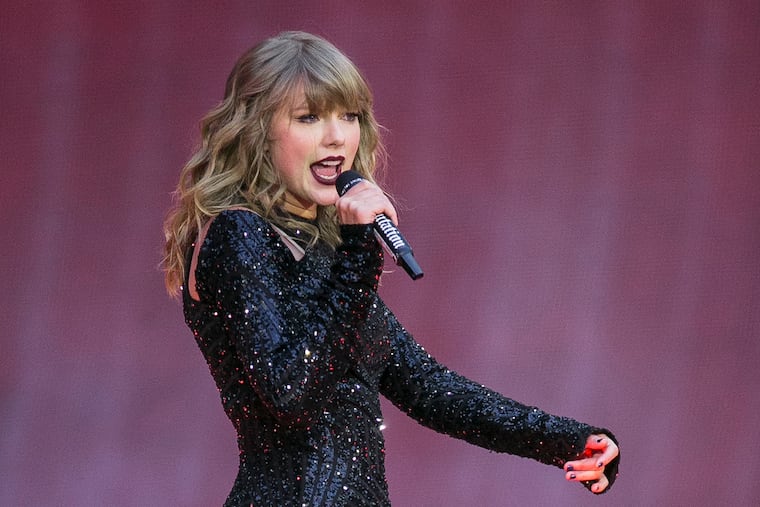 FILE - In this June 22, 2018, file photo, singer Taylor Swift performs on stage in concert at Wembley Stadium in London. ABC will air the one-hour concert special “Taylor Swift City of Lover Concert” at 10 p.m. EDT. It was filmed last September at L’Olympia Theater in Paris. (Photo by Joel C Ryan/Invision/AP, File)