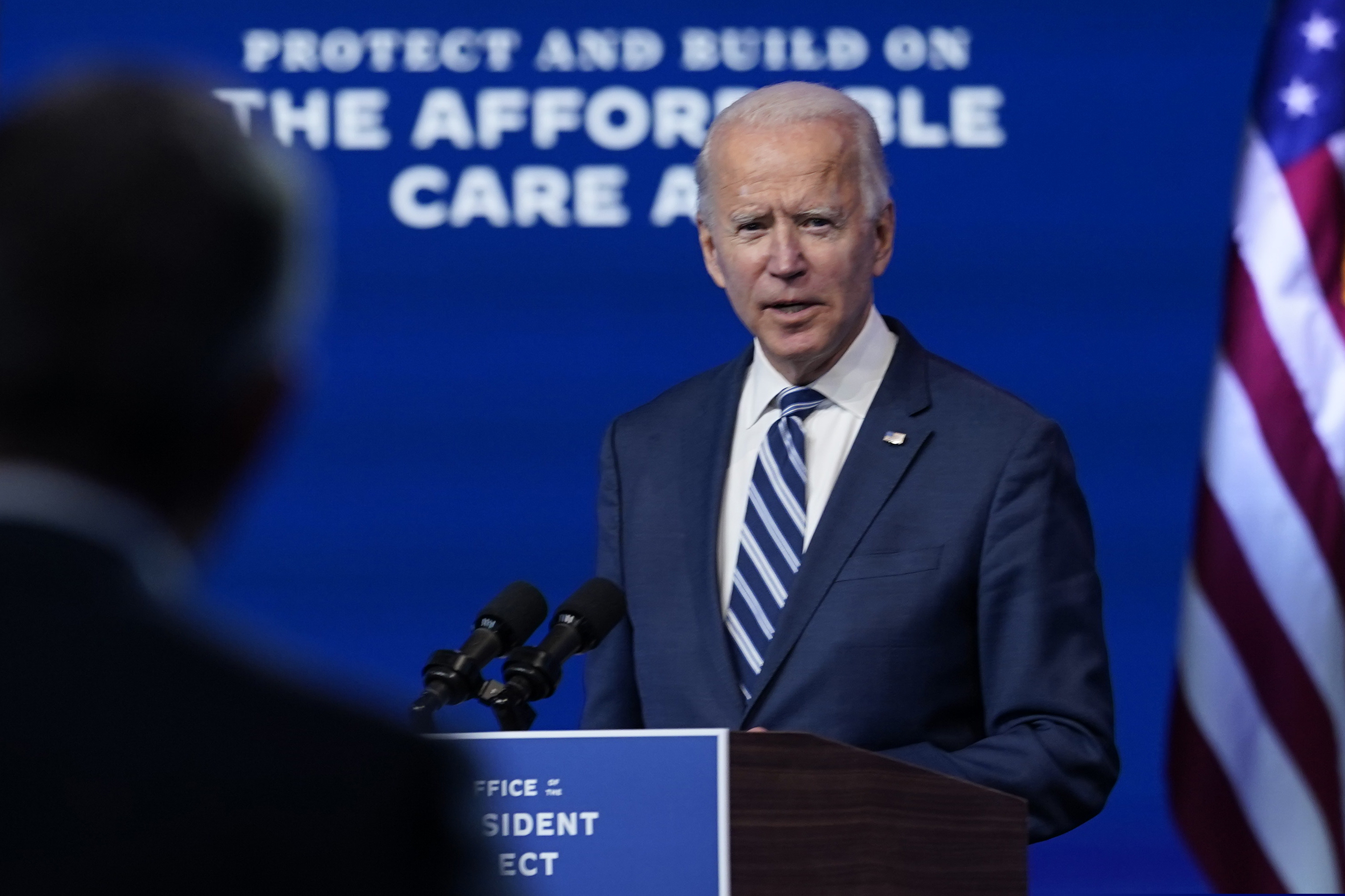 President-elect Joe Biden answers a reporter's question at The Queen theater, Tuesday, Nov. 10, 2020, in Wilmington, Del. (AP Photo/Carolyn Kaster)