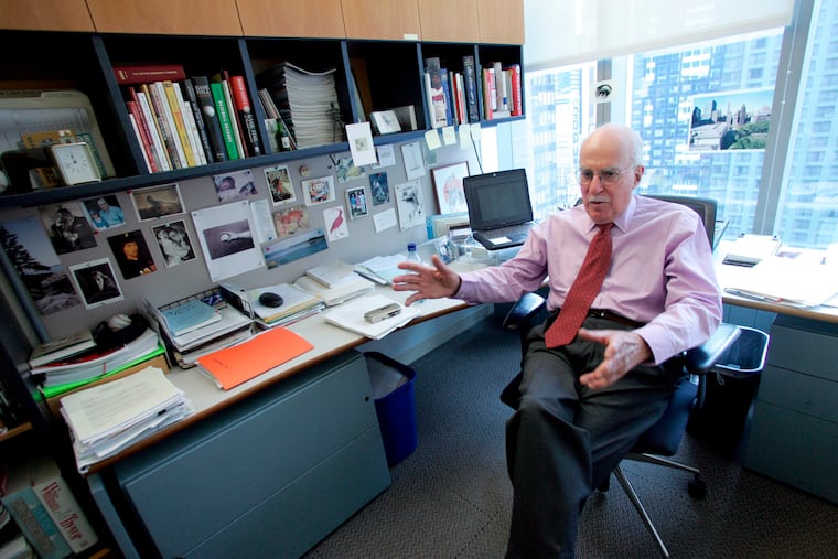 Author Roger Angell gestures during an interview at his office at the New Yorker magazine on April 4, 2006, in New York. Angell, a longtime New Yorker writer and editor, has died the New Yorker announced Friday, May 20, 2022. He was 101.