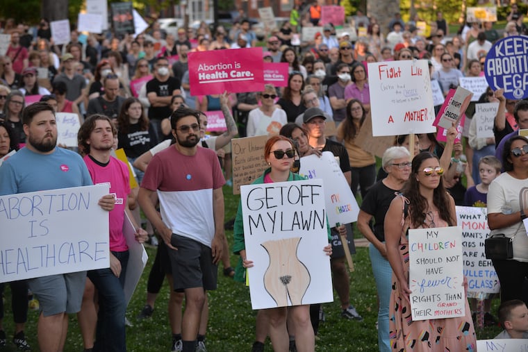 A rally protesting the Supreme Court decision against abortion rights was held in Musser Park in Lancaster on Friday.