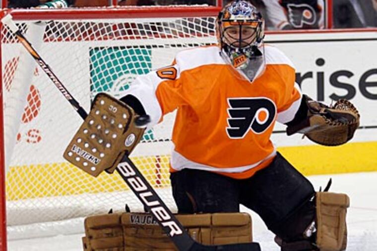 Despite allowing four goals, Ilya Bryzgalov and the Flyers pulled through with a 5-4 win over the Blackhawks. (Yong Kim/Staff Photographer)