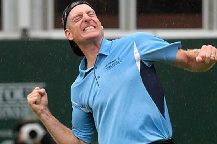 Jim Furyk celebrates winning the FedEx Cup and The Tour Championship golf tournament at East Lake Golf Club in Atlanta. (Dave Martin/AP)