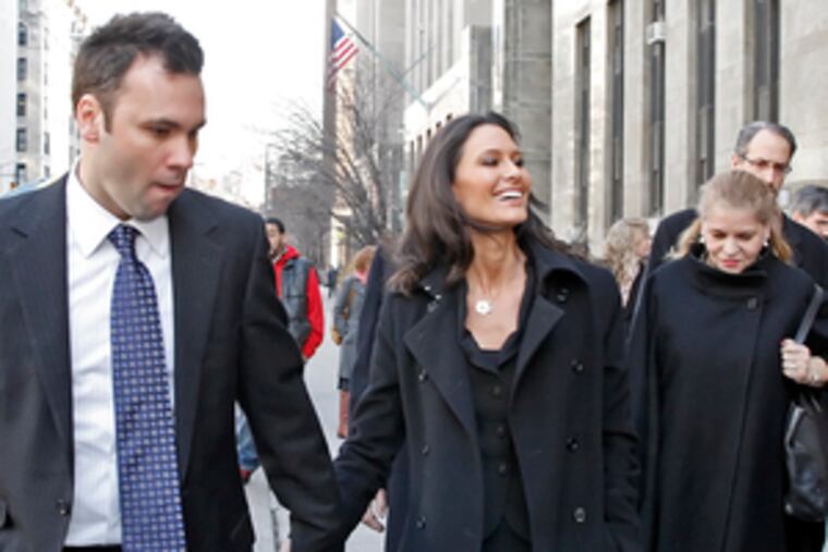 Alycia Lane walks with her boyfriend, Chris Booker, and her mother (right) outside courthouse.