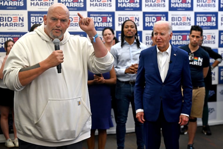 Sen. John Fetterman (D., Pa). speaks in support of President Joe Biden in July in Philadelphia. Fetterman backed Biden as most Democrats called for him to exit the race following his debate with Donald Trump.