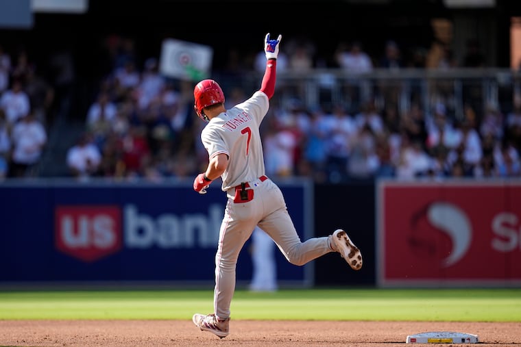 Philadelphia Phillies' Trea Turner celebrates after hitting a two-run home run during the second inning of a baseball game against the San Diego Padres, Monday, Sept. 4, 2023, in San Diego.