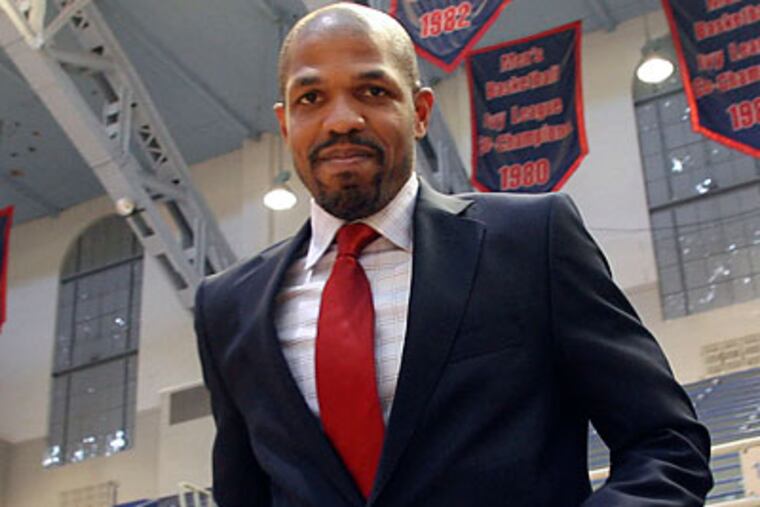 "We will get it done," Jerome Allen told the crowd of Penn players and supporters. (Yong Kim/Staff Photographer)