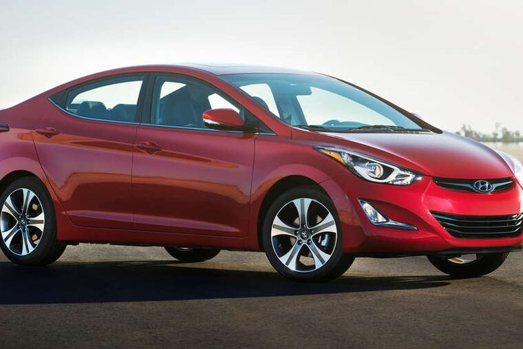 The 2015 Hyundai Elantra carries the same design as its predecessors, but handles and accelerates better.