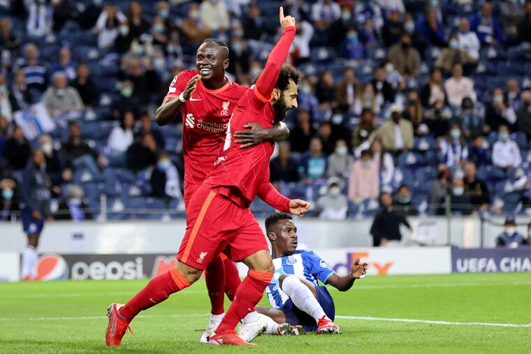 Mohamed Salah (center) celebrated after scoring for Liverpool against Porto in the Champions League on Tuesday. Liverpool hosts Manchester City on Sunday.